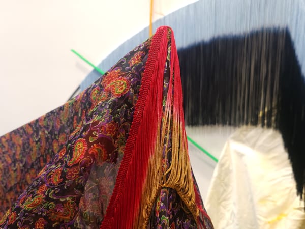 A Textile Show Ruptures, Cascades, and Bleeds