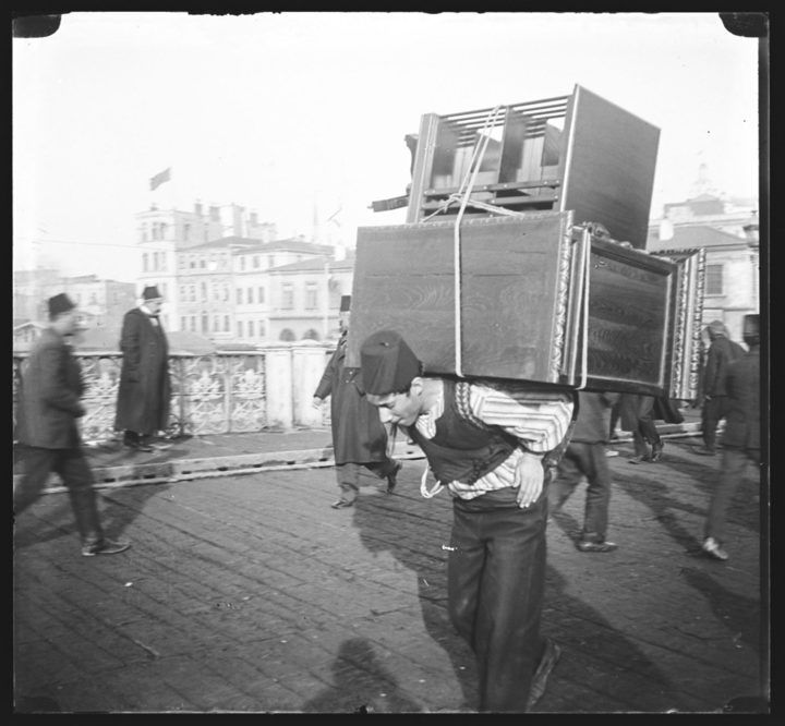 Turkish man carrying furniture on his back (c. 1900), glass plate negative